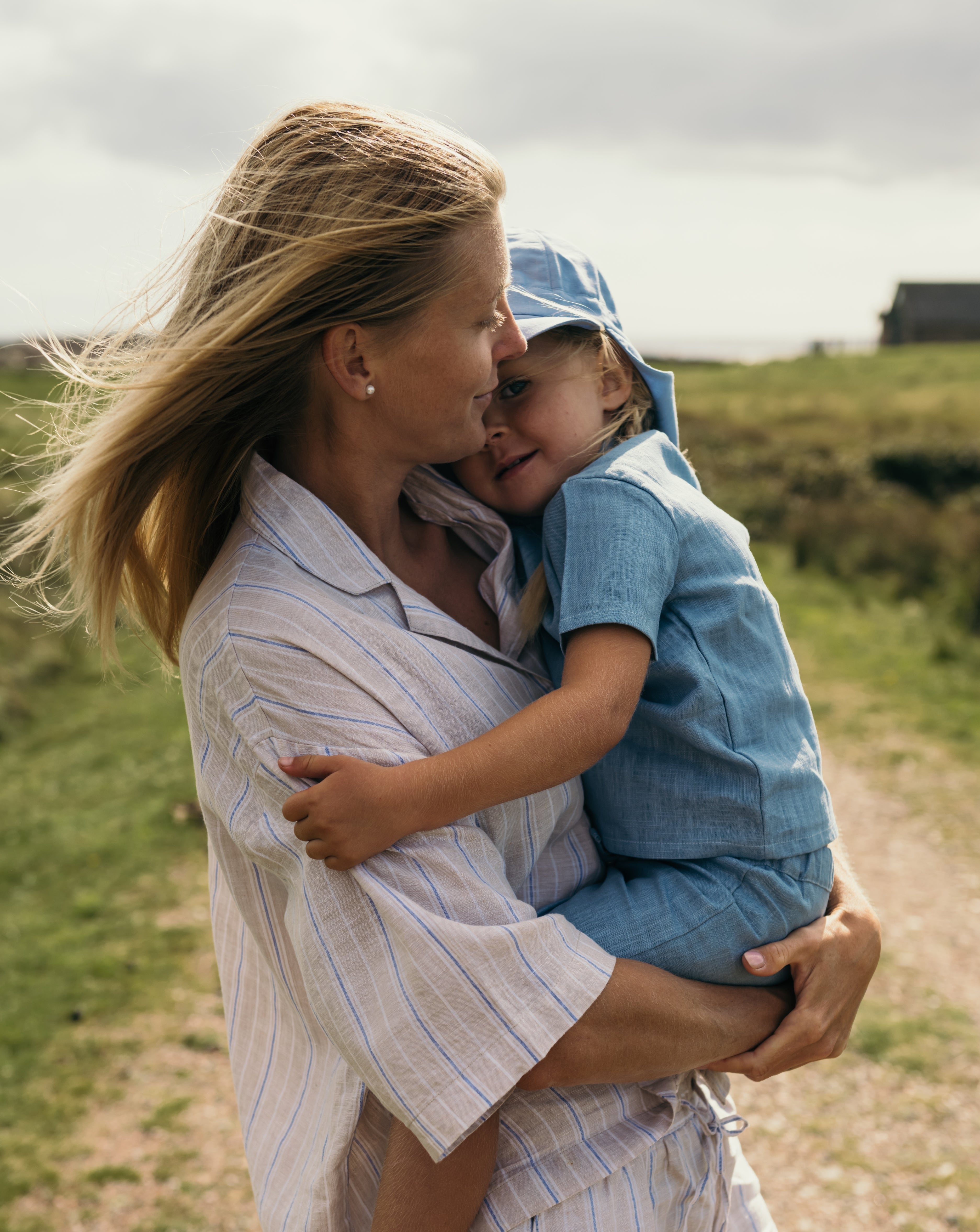 Blue linen shirt worn by a toddler – airy and comfortable summer outfit made of 100% linen