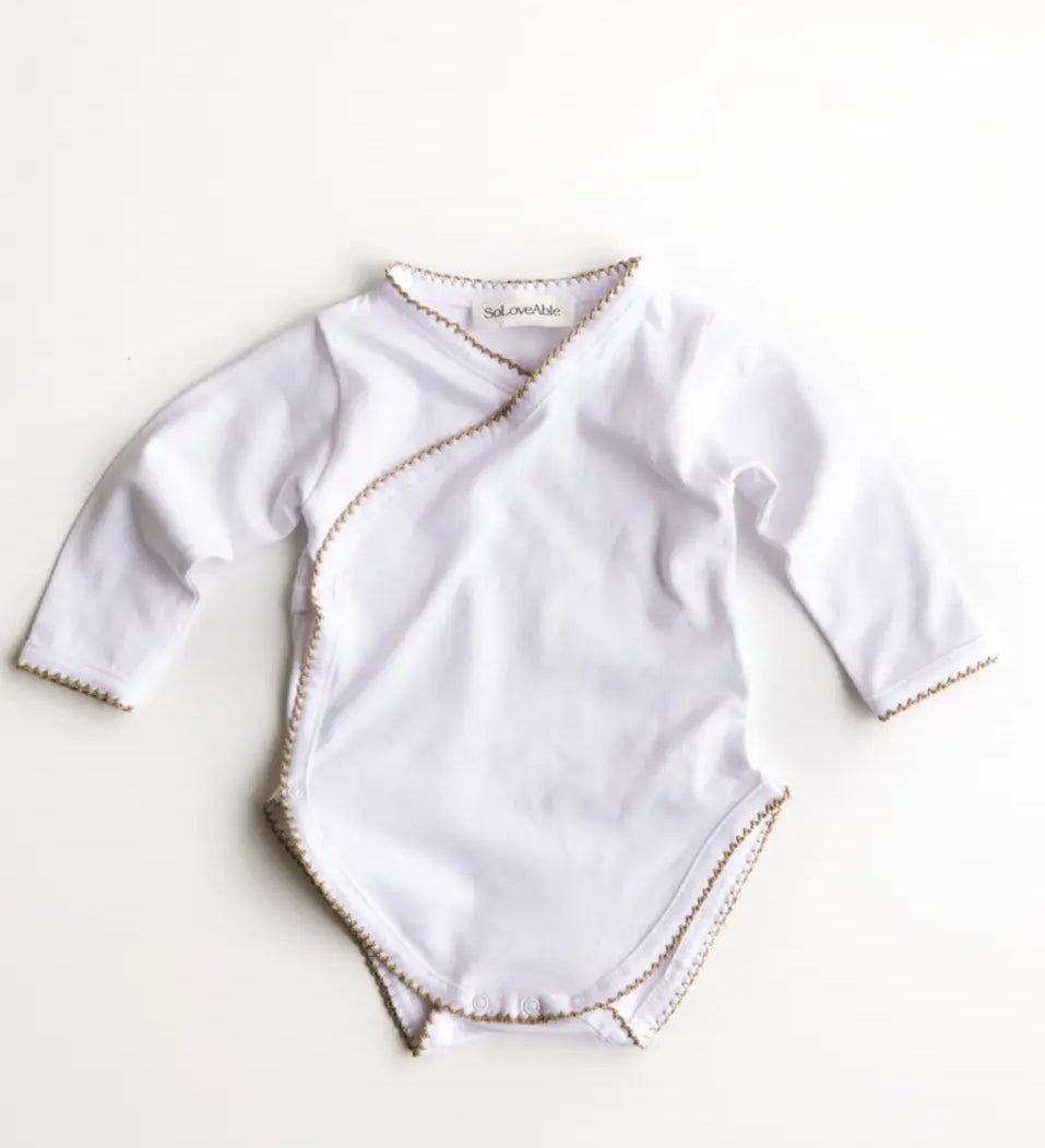 Soloveable baby bodysuit with crochet trim in brown organic cotton