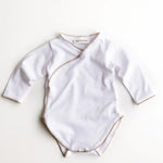 Soloveable baby bodysuit with crochet trim in brown organic cotton