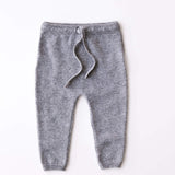Baby cashmere pants in heather grey, front view.