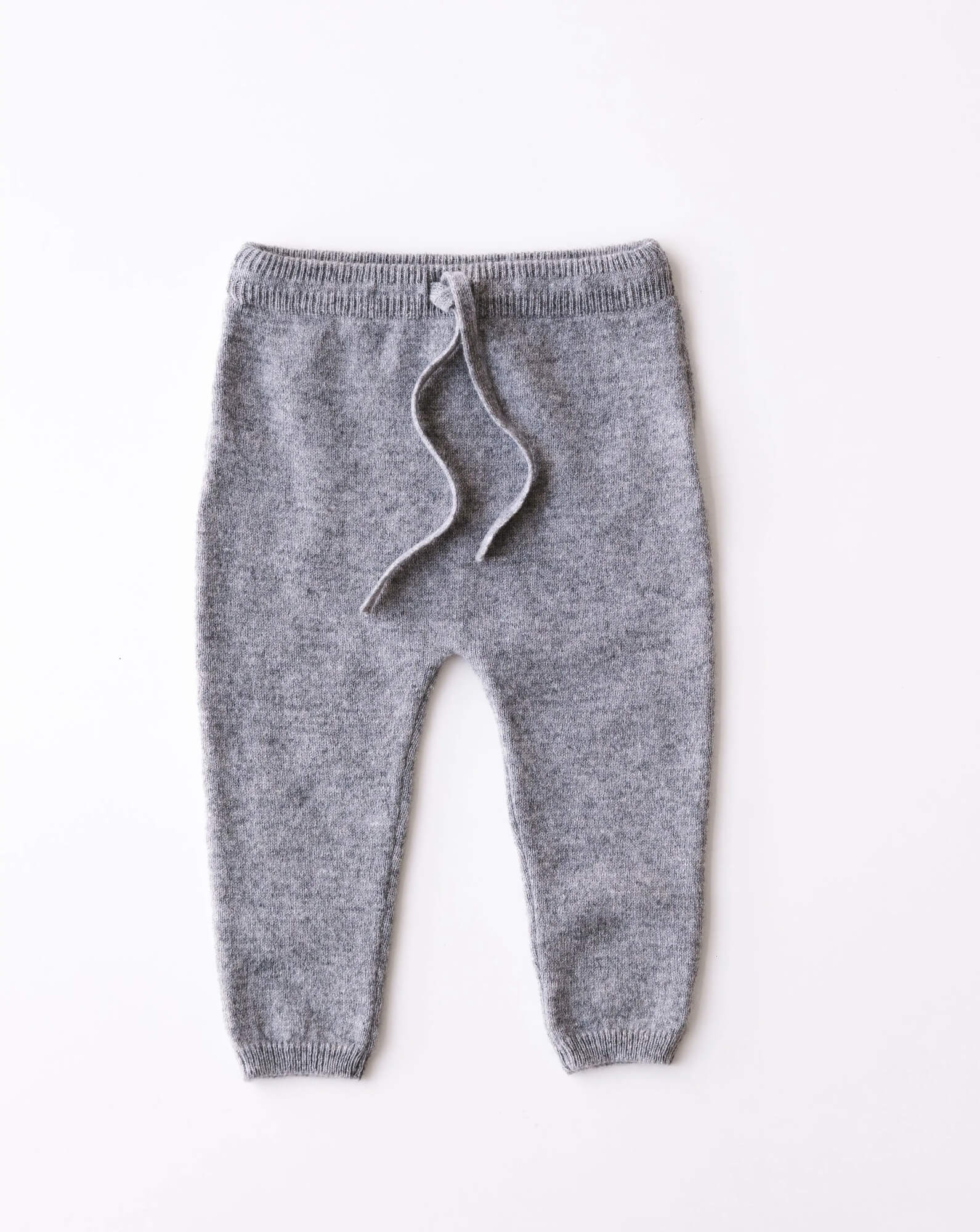 Baby cashmere pants in heather grey, front view.