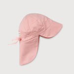 Pink linen sun hat with neck protection and adjustable strap for babies and toddlers, flat lay product photo