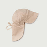 Beige linen sun hat for babies with neck protection and adjustable tie, side view
