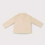 Back view of lightweight long-sleeve beige linen shirt for babies and toddlers.
