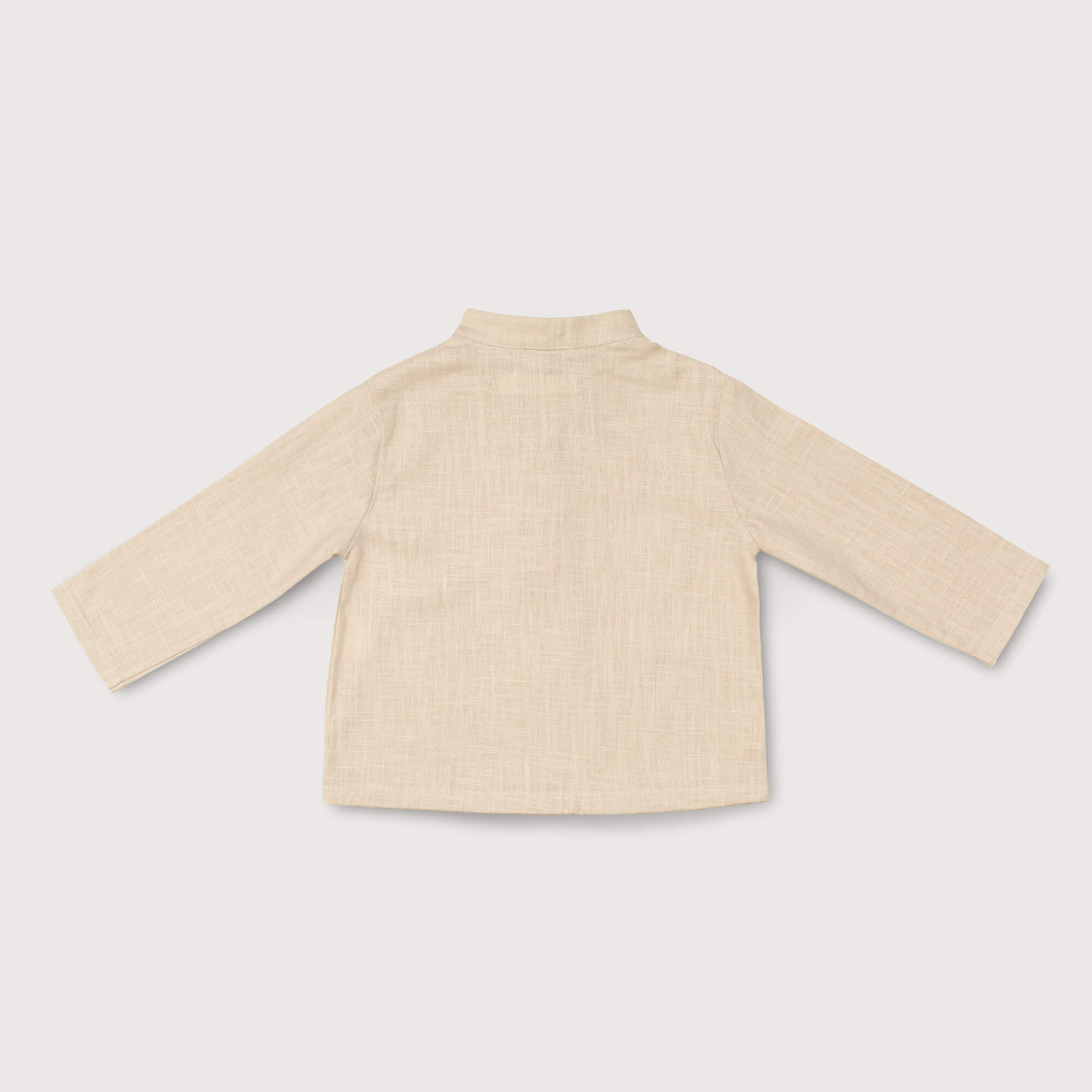 Back view of lightweight long-sleeve beige linen shirt for babies and toddlers.
