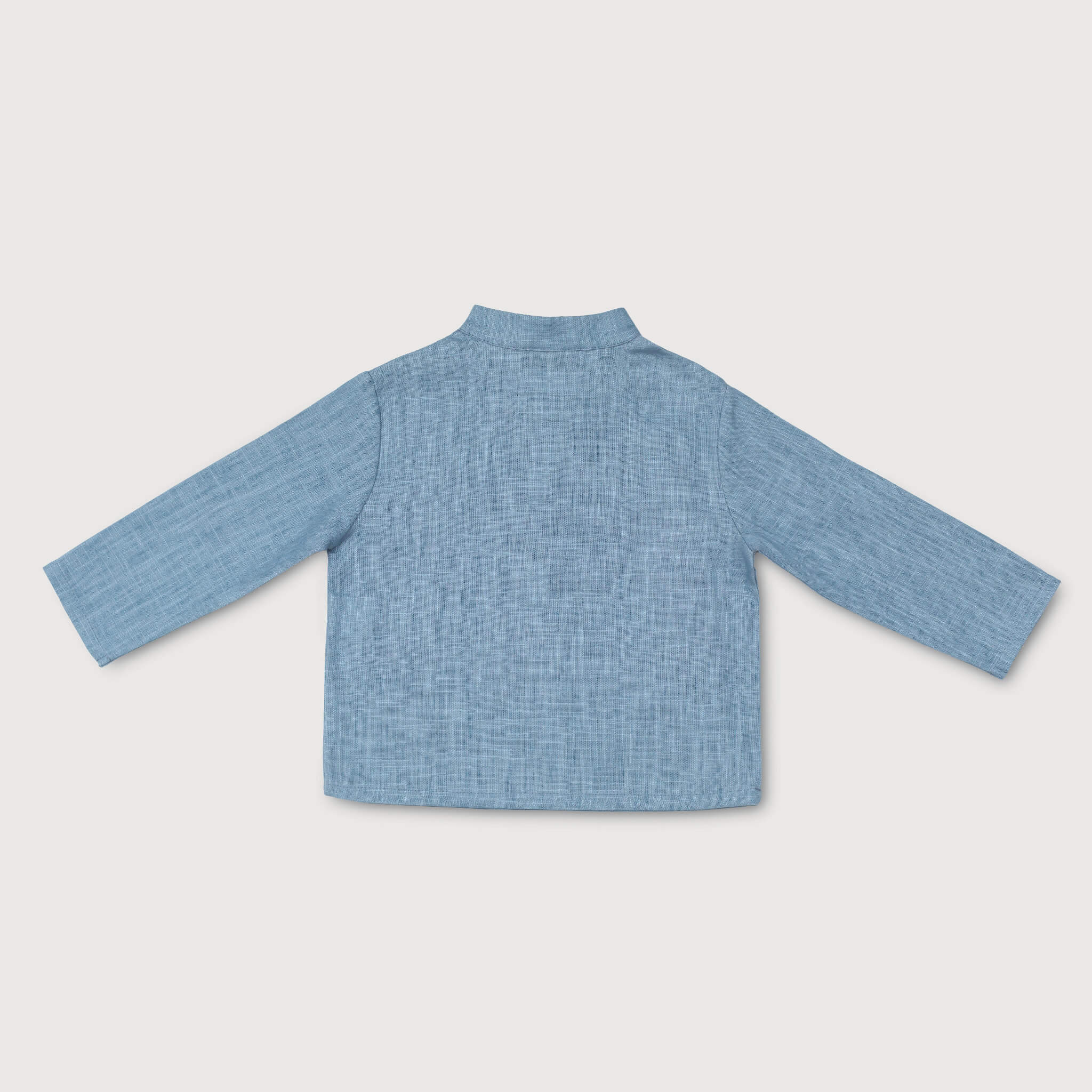 Back view of lightweight long-sleeve blue linen shirt for babies and toddlers.