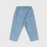 Back view of lightweight blue linen pants for babies and toddlers.