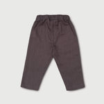 Back view of lightweight brown linen pants for babies and toddlers.