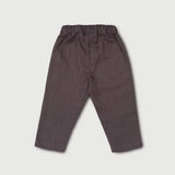 Back view of lightweight brown linen pants for babies and toddlers.