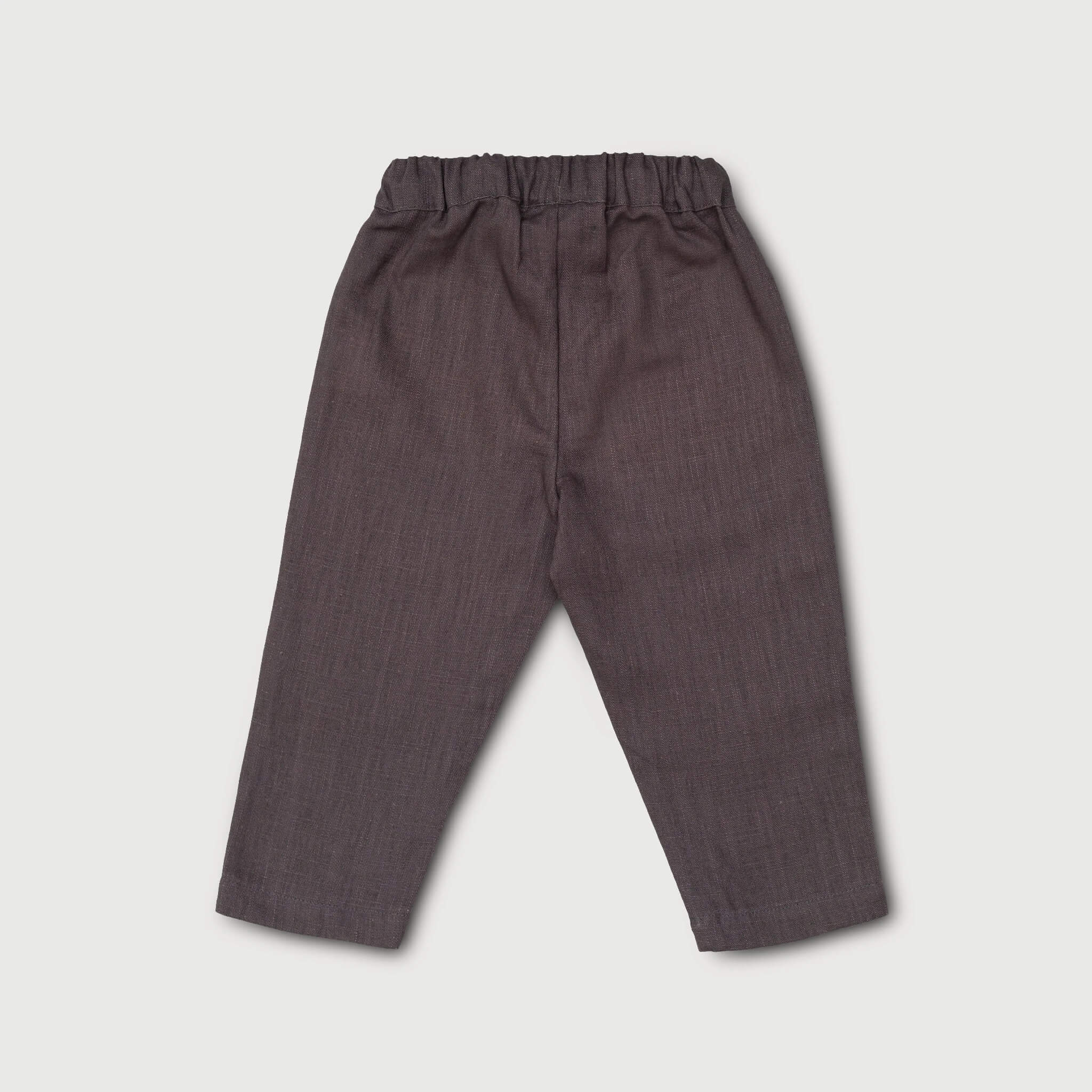 Back view of lightweight brown linen pants for babies and toddlers.