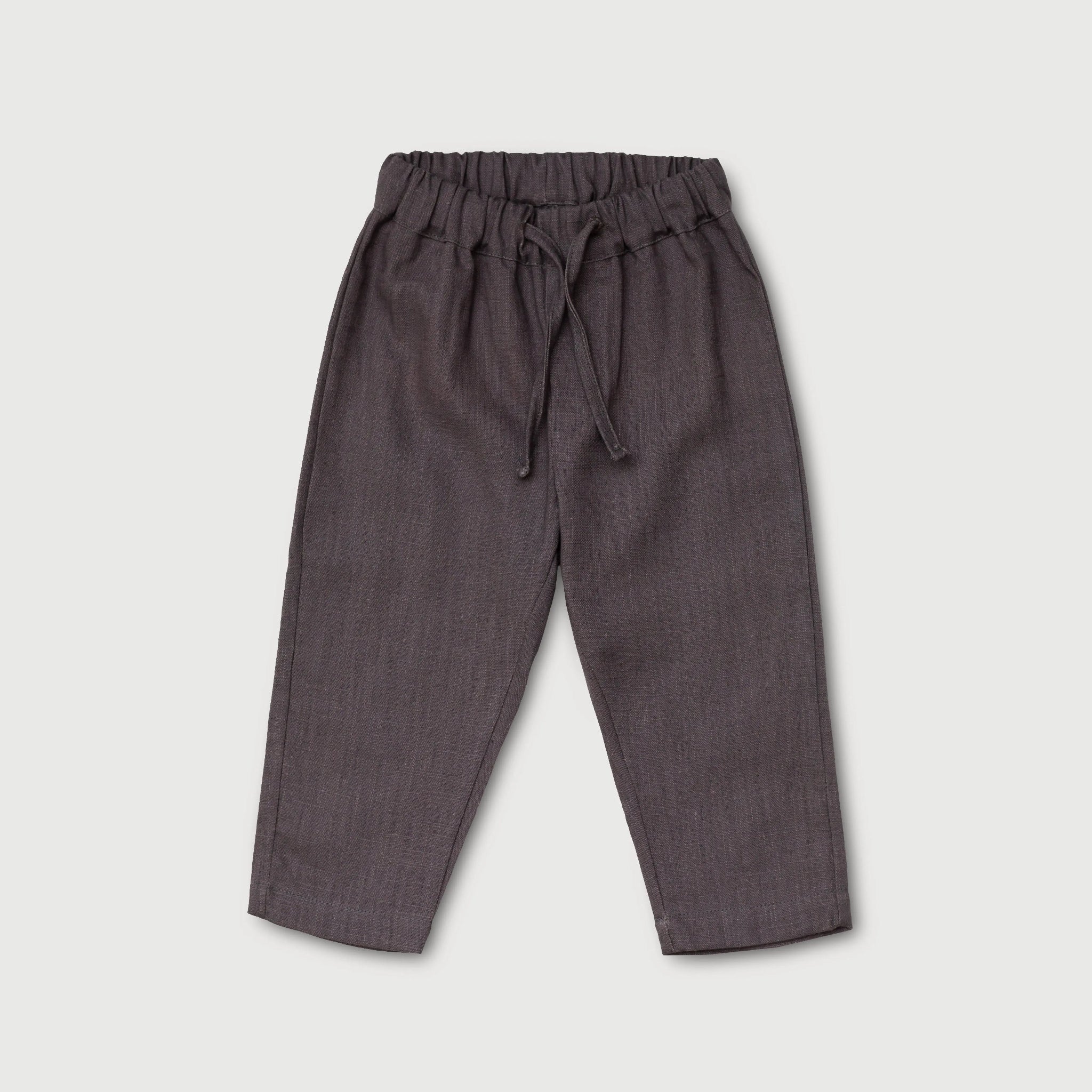 Front view of long brown linen pants for babies and toddlers with elastic waistband and drawstring.