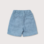 Back view of lightweight short blue linen pants for babies and toddlers.