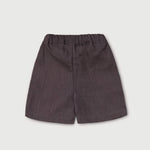 Back view of lightweight short brown linen pants for babies and toddlers.