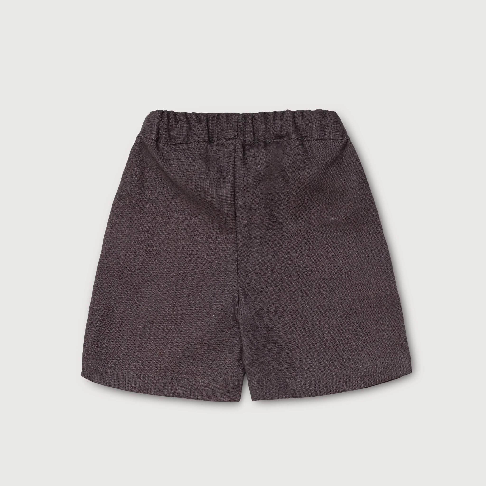 Back view of lightweight short brown linen pants for babies and toddlers.