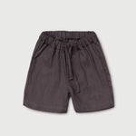 Front view of short brown linen pants for babies and toddlers with elastic waistband and drawstring.