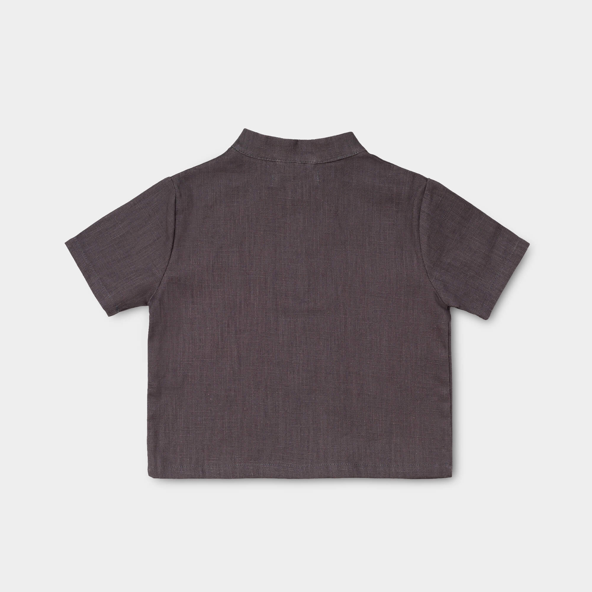 Back view of a lightweight brown linen short-sleeve shirt for babies and toddlers.