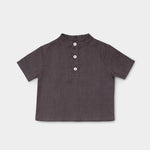 Front view of a short-sleeve brown linen shirt for babies and toddlers with a three-button placket.