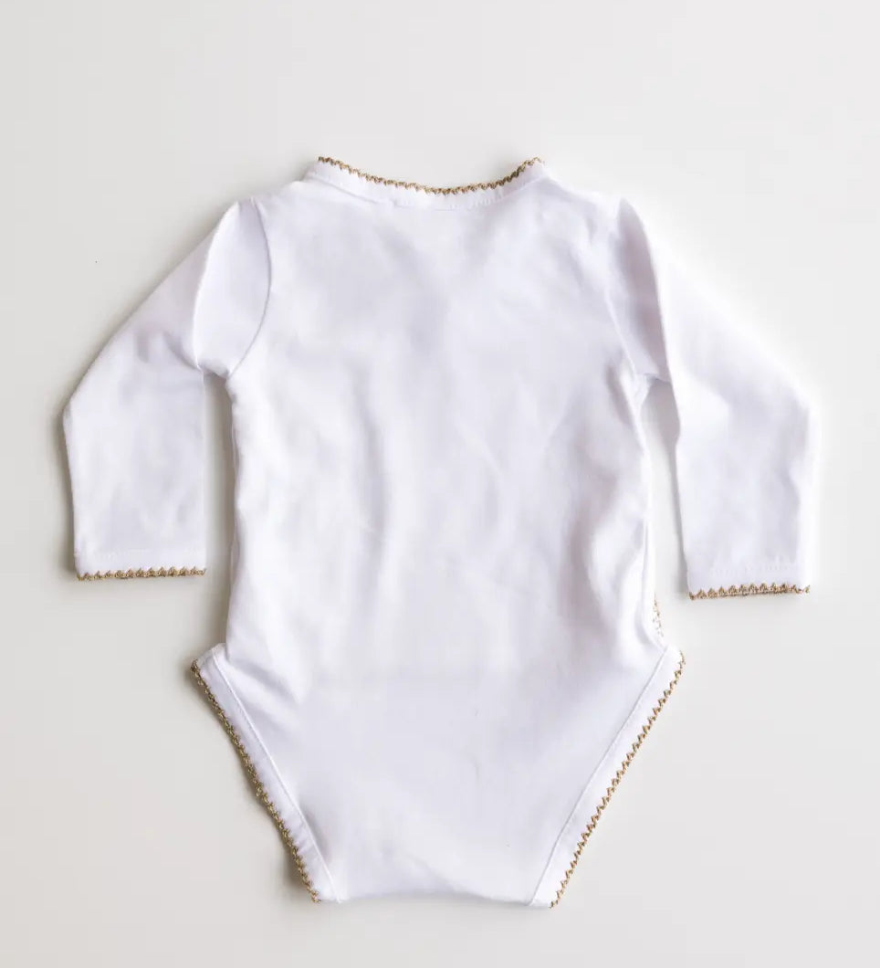 Back view of white baby bodysuit with caramel brown crochet trim.