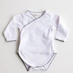 Baby bodysuit in white with heather grey crochet trim, front view.