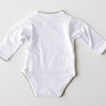 Back view of white baby bodysuit with sage green crochet trim.