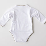 Back view of white baby bodysuit with sage green crochet trim.