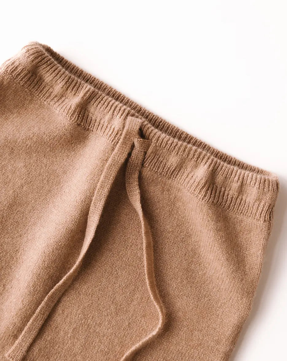 Close-up of waistband on caramel brown baby cashmere pants