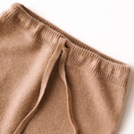 Close-up of waistband on caramel brown baby cashmere pants