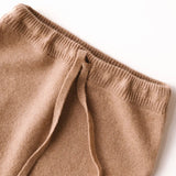 Close-up of waistband on caramel brown baby cashmere pants