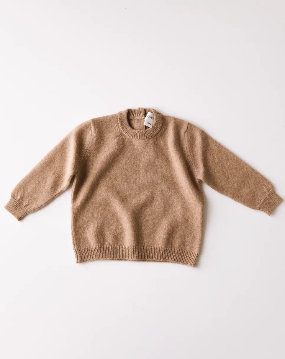 Baby cashmere sweater in caramel brown, front view.