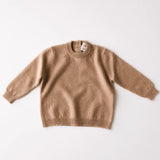 Baby cashmere sweater in caramel brown, front view.